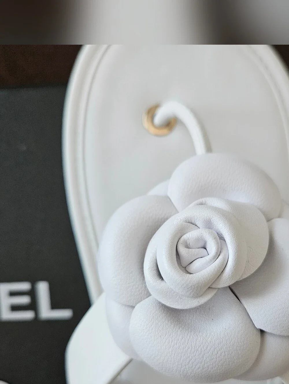 CHANEL White Camellia Leather Slide Sandals with Gold Eyelets